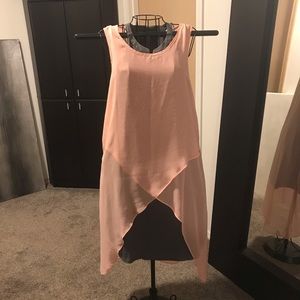 Peachy sheer overlay piece.